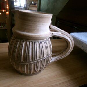 vintage signed pottery pitcher.